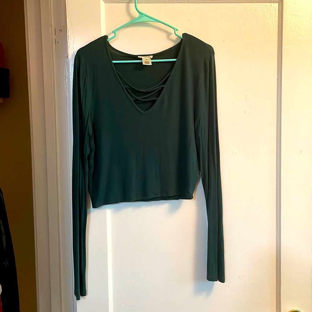 Wear Seal Dark Green long sleeved top.
